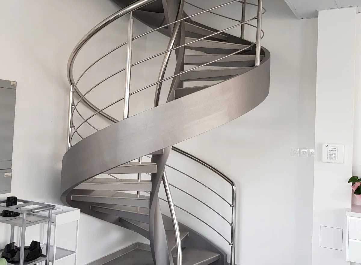 Space-saving spiral metal staircase for modern small homes and duplex interiors