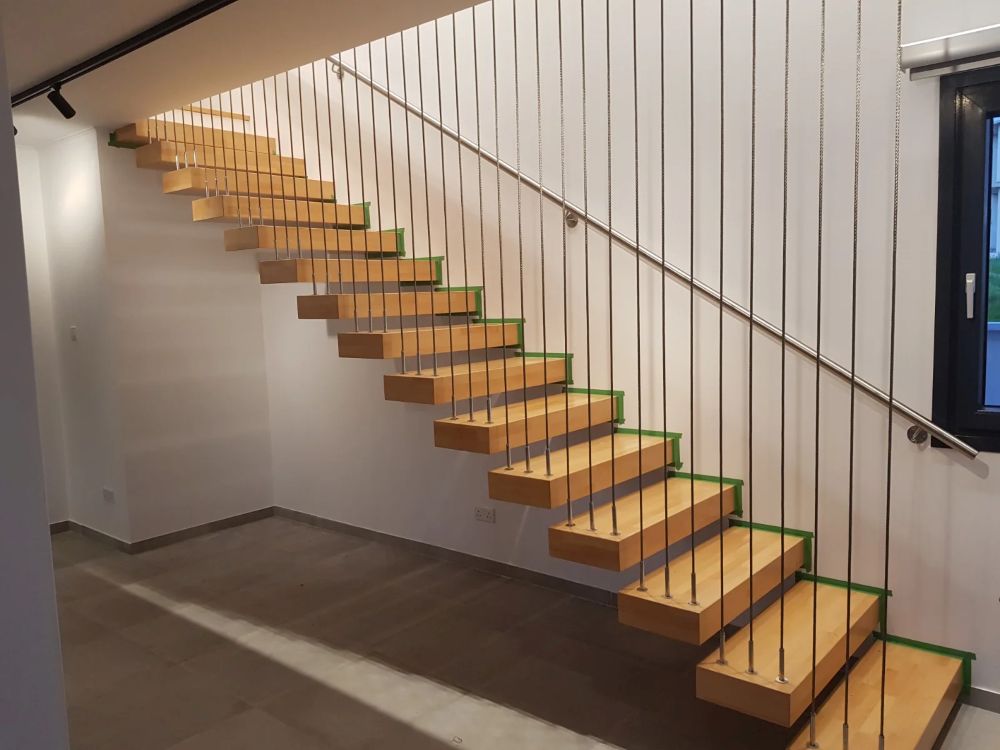 Timber staircase designed for a modern Cyprus property by Technometalliki in Cyprus